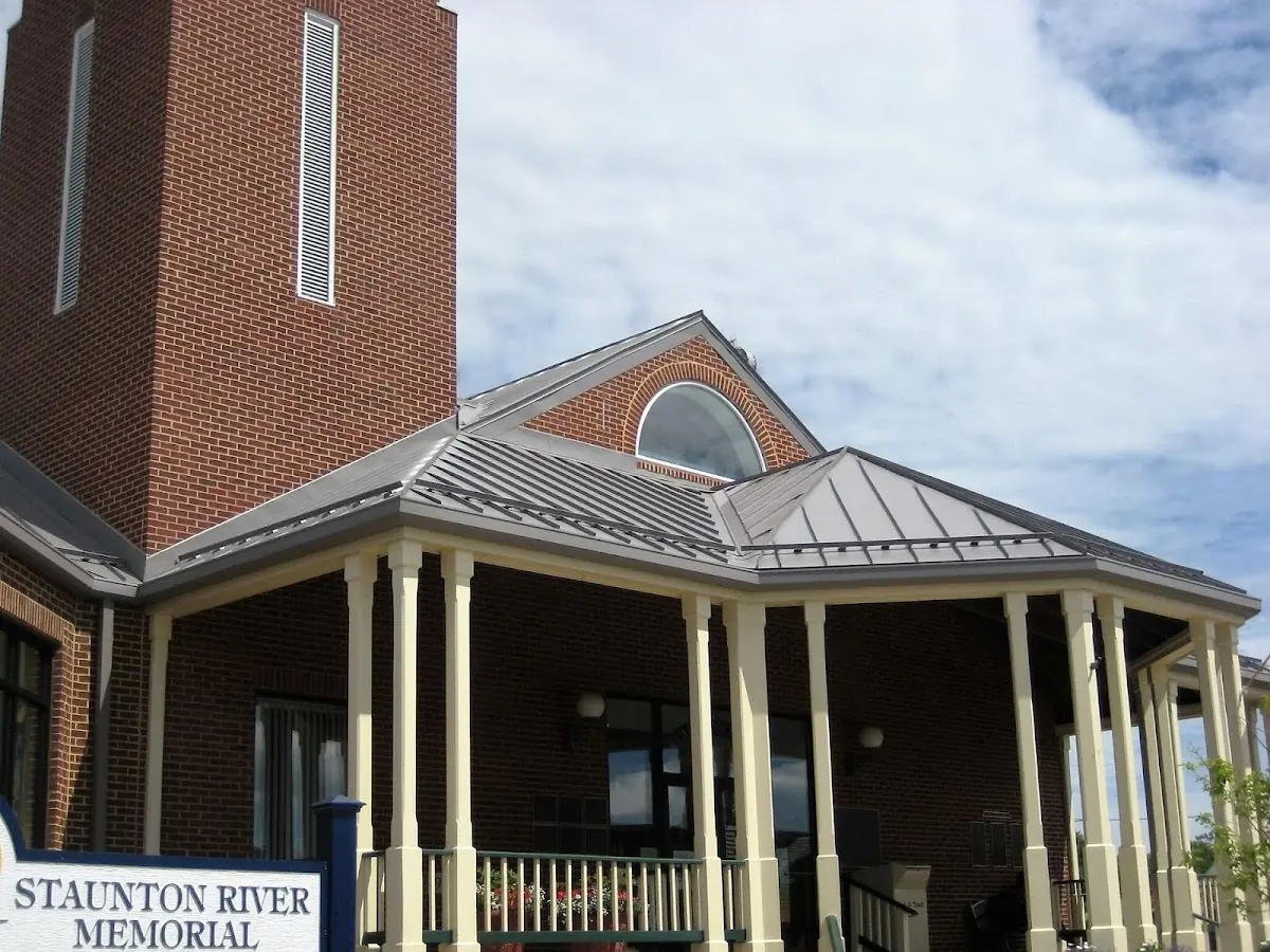 Skilled roofing craftsmen working on a residential roof in Durham